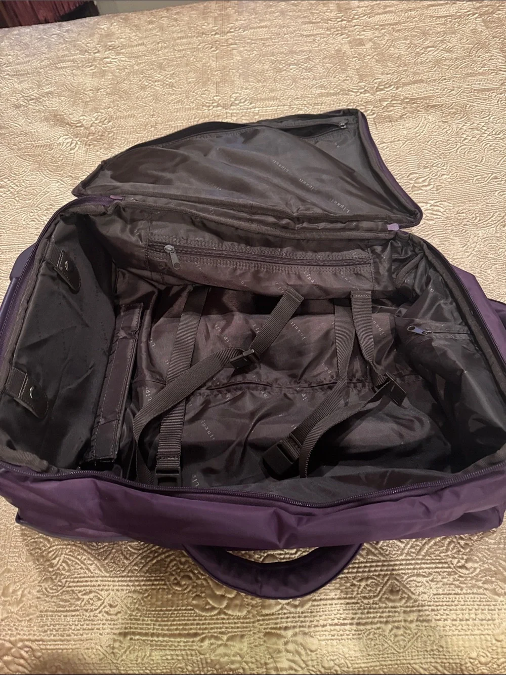Lipault Men or Wonen’s Rolling Duffel in Deep Plum